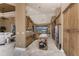 Open concept kitchen with center island and views into living space at 1367 Grebe Dr, Punta Gorda, FL 33950
