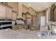 Modern kitchen with stainless steel appliances and granite countertops at 1367 Grebe Dr, Punta Gorda, FL 33950