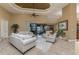 Spacious living room with high ceilings, tile floors, lots of seating, and a view to the outside at 1367 Grebe Dr, Punta Gorda, FL 33950