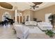 Spacious living room with high ceilings, tile floors, lots of seating, and a view to the outside at 1367 Grebe Dr, Punta Gorda, FL 33950