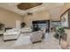 Spacious living room with high ceilings, tile floors, lots of seating, and a view to the outside at 1367 Grebe Dr, Punta Gorda, FL 33950
