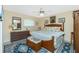Serene bedroom with a decorative rug, window view, and dresser at 1374 Grebe Dr, Punta Gorda, FL 33950