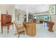 Elegant home office featuring a classic desk, stylish decor, and ample natural light at 1374 Grebe Dr, Punta Gorda, FL 33950