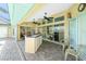 View of the outdoor kitchen and dining area at 1374 Grebe Dr, Punta Gorda, FL 33950