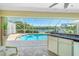Outdoor pool area showcasing a scenic view of the water at 1374 Grebe Dr, Punta Gorda, FL 33950