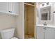 Tiled shower and vanity in the bathroom space at 1510 Orlando Blvd, Port Charlotte, FL 33952