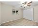 Bedroom includes a ceiling fan and a closet with sliding doors at 1510 Orlando Blvd, Port Charlotte, FL 33952