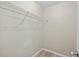 Walk-in closet featuring light wood floors and a wire shelving system for storage at 1510 Orlando Blvd, Port Charlotte, FL 33952