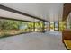 A spacious screened patio features a sink, ample counter space and backyard views at 1510 Orlando Blvd, Port Charlotte, FL 33952