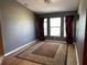 Comfortable room with a patterned rug and curtains, creating a cozy ambiance at 16072 Galiano Ct, Punta Gorda, FL 33955