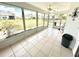 Relaxing screened patio with tiled flooring and an outdoor view at 16072 Galiano Ct, Punta Gorda, FL 33955