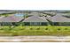 Lush backyard view from above of meticulously maintained lawns at 16079 Bandermill Dr, Port Charlotte, FL 33953
