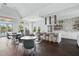 Resident common area with a kitchen, barstool seating, and table seating at 16079 Bandermill Dr, Port Charlotte, FL 33953