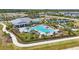 Aerial view of the community pool and lounging area at 16079 Bandermill Dr, Port Charlotte, FL 33953