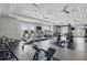 This gym is equipped with treadmills, stationary bikes, weights and other exercise equipment at 16079 Bandermill Dr, Port Charlotte, FL 33953