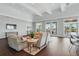 Relaxing resident lounge area with neutral tones and comfortable seating at 16079 Bandermill Dr, Port Charlotte, FL 33953