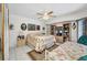 Spacious bedroom featuring ceiling fan, decor, two twin beds and natural light at 17210 Chase Ave, Port Charlotte, FL 33948