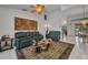 A well-decorated living area features comfortable leather seating, ornate décor, and a decorative rug, offering a cozy space at 17210 Chase Ave, Port Charlotte, FL 33948