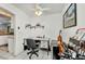 Well-lit office with a practical desk, shelving and ample storage for efficient work or creative endeavors at 17210 Chase Ave, Port Charlotte, FL 33948