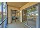 Enclosed patio with view to the outside at 19505 Quesada Ave # Qq101, Port Charlotte, FL 33948