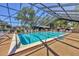Enjoy this relaxing indoor pool with a screened-in enclosure and lounge chairs for soaking up the sun at 19505 Quesada Ave # Qq101, Port Charlotte, FL 33948