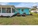 Backyard with cozy seating and tropical plants at 20238 Banner Ave, Port Charlotte, FL 33952
