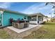 Backyard with patio and hot tub at 20238 Banner Ave, Port Charlotte, FL 33952