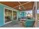 Cozy screened-in porch with comfortable seating area at 20238 Banner Ave, Port Charlotte, FL 33952
