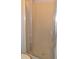Shower enclosure featuring a framed sliding glass door in bathroom at 21161 Knollwood Ave, Port Charlotte, FL 33952