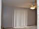 Bedroom with a sliding glass door and blinds at 21161 Knollwood Ave, Port Charlotte, FL 33952