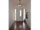 Entryway with tile floor and a front door at 21161 Knollwood Ave, Port Charlotte, FL 33952