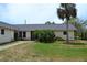 Single story home with a lawn at 21161 Knollwood Ave, Port Charlotte, FL 33952