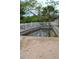 Backyard view of pool with a white fence at 21161 Knollwood Ave, Port Charlotte, FL 33952