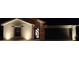 Eye-catching home exterior at night, featuring dramatic uplighting that emphasizes its architecture and design at 21310 Quesada Ave, Port Charlotte, FL 33952
