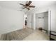 Cozy bedroom with tile floors, ceiling fan, and closet at 2336 Redfern St, Port Charlotte, FL 33948