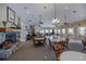 Spacious clubhouse interior features a stone fireplace, ample seating, and neutral decor at 25511 Heritage Lake Blvd # 8, Punta Gorda, FL 33983
