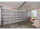 This garage features a functional space, an overhead door and a window offering natural light at 25511 Heritage Lake Blvd # 8, Punta Gorda, FL 33983