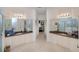 Bright main bathroom with dual vanities and separate shower rooms at 25511 Heritage Lake Blvd # 8, Punta Gorda, FL 33983