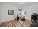 Sunny office with wood floors, natural light, and ample space for a desk at 25511 Heritage Lake Blvd # 8, Punta Gorda, FL 33983