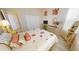 Bedroom with light colored walls and decor, large closet, and lots of natural light at 26073 Feathersound Dr, Punta Gorda, FL 33955