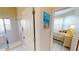 Hallway leading to the bedroom and bathroom with easy access to the shower at 26073 Feathersound Dr, Punta Gorda, FL 33955