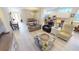 Spacious open floor plan with living room, dining area, and kitchen featuring modern finishes at 26073 Feathersound Dr, Punta Gorda, FL 33955