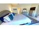 Calm main bedroom with soft lighting, en-suite bathroom and a walk-in closet at 26073 Feathersound Dr, Punta Gorda, FL 33955