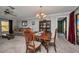 Dining area featuring a wooden table set and a view into the living room at 3663 Sterling Rd, Venice, FL 34293