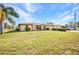 A single-story home shows a well-maintained lawn and landscaping at 3663 Sterling Rd, Venice, FL 34293