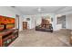 Spacious living room with pass-through to kitchen, showcasing seamless flow at 3663 Sterling Rd, Venice, FL 34293