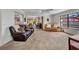 Open layout of the living room, den and dining area at 3663 Sterling Rd, Venice, FL 34293