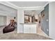 Open concept living area with pass-through to kitchen at 3663 Sterling Rd, Venice, FL 34293
