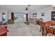 Cozy living room with large windows providing ample natural light at 3663 Sterling Rd, Venice, FL 34293