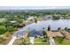 Desirable waterfront home with direct canal access, beautifully landscaped yard, and serene surroundings at 474 Lomond Dr, Port Charlotte, FL 33953